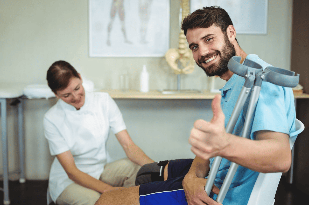 Patient with crutches receiving care for motor vehicle accident injury